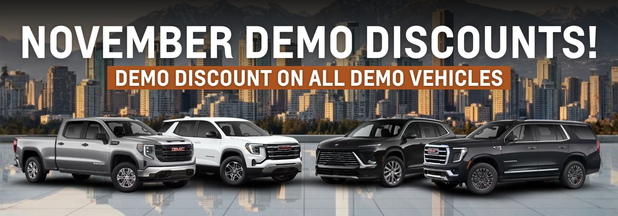 November promotional banner featuring a selection of demo vehicles, including trucks and SUVs, with a special discount offer on all demo vehicles in a cityscape background.