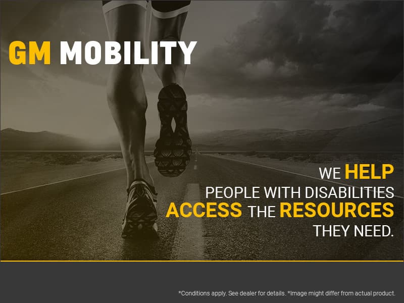 Person jogging on a road with mountains in the background, promoting GM Mobility's services to help people with disabilities access essential resources.