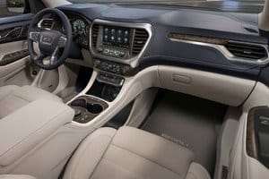 Luxurious interior of a modern SUV showcasing a sleek dashboard, high-tech infotainment system, and comfortable leather seating. The image highlights a blend of elegance and functionality, perfect for tech-savvy drivers.
