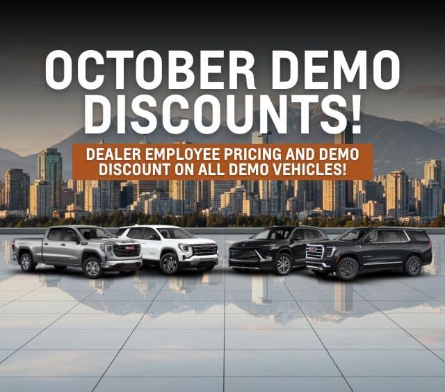 Promotional image for October demo discounts featuring a lineup of demo vehicles, including trucks and SUVs, with text highlighting dealer employee pricing and special discounts on all demo vehicles. Background shows a city skyline.