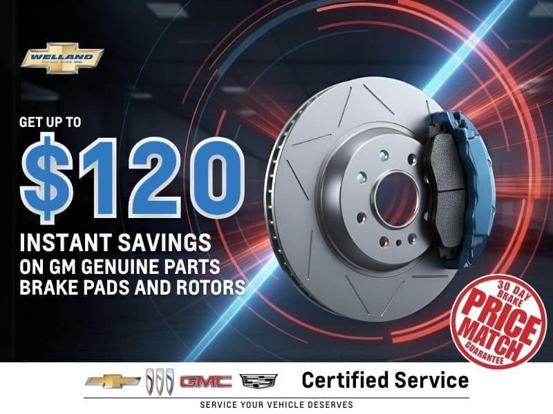 Promotional graphic for Welland Chevrolet featuring a close-up of GM genuine brake pads and rotors, highlighting savings of up to $120. The image includes a price match guarantee and emphasizes certified service for vehicle maintenance.