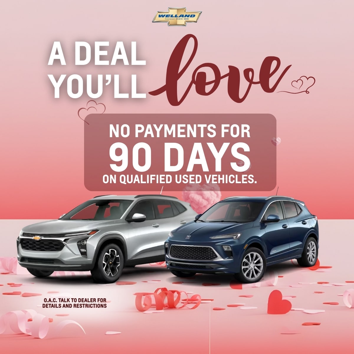 Car dealership promotion with two SUVs, offering no payments for 90 days on qualified used vehicles.