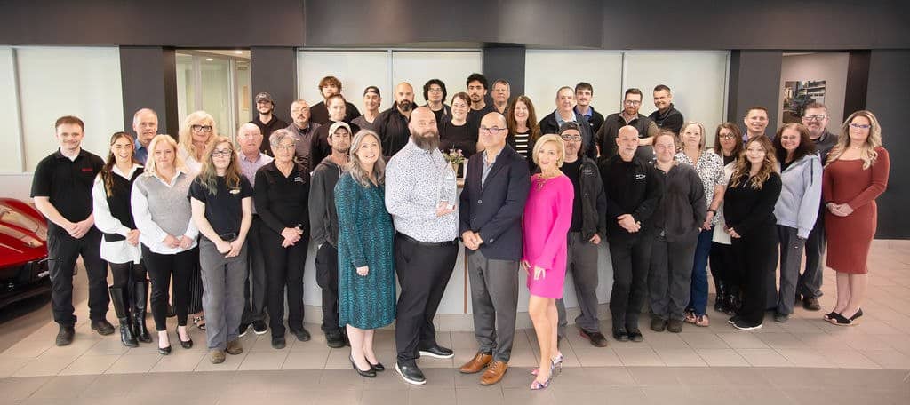 The full Welland Chevrolet Buick GMC team gathered in the showroom